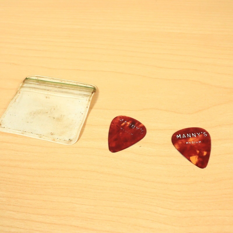 2-vintage-manny-s-music-new-york-city-faux-shell-guitar-pick-rare-medium (2) Vintage Manny's Music New York City Faux Shell Guitar Pick Rare, Medium