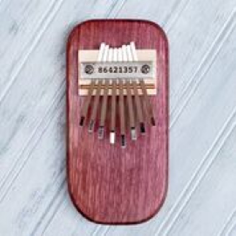 purple-heart-thumb-piano Purple Heart Thumb Piano
